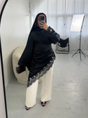 TOP LONG ASYMÉTRIQUE À DENTELLES NOIR